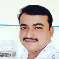 Professional headshot in Pune office
