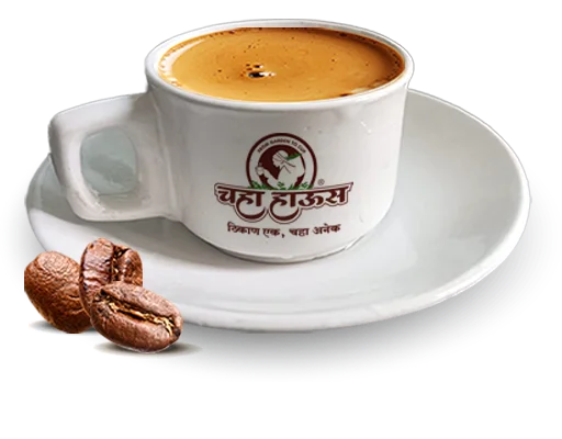 A white ceramic cup and saucer featuring the 'Chaha House' logo, filled with hot coffee and shown with three roasted coffee beans in the foreground.